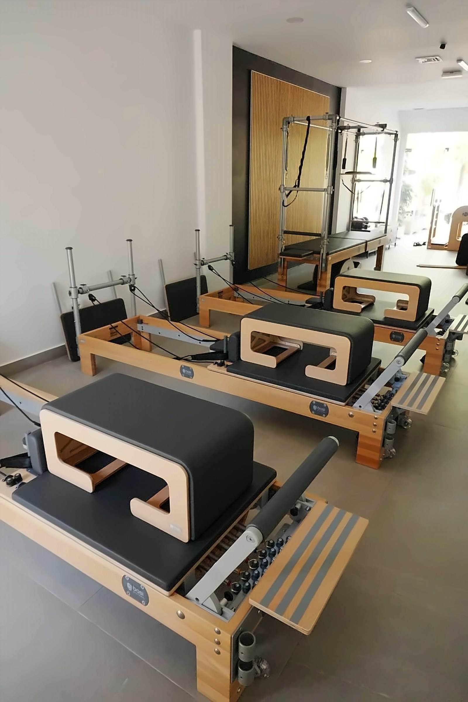 BASI Systems Reformers side by side with their sitting boxes, ready for a class