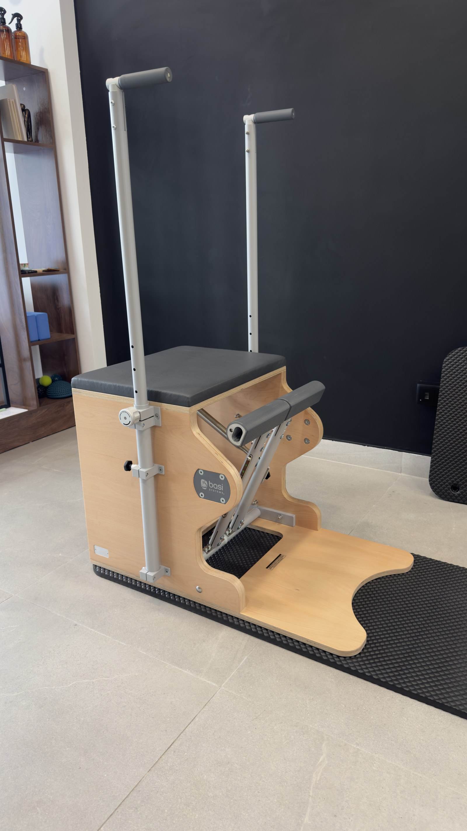 BASI Systems Wunda Chair against a dark wall
